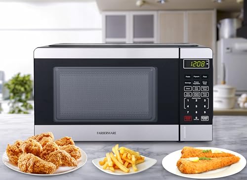 Farberware 0.7 Cu. Ft. Countertop Microwave Oven – 700 Watts Power, Auto Cook Settings, Defrost, Easy Clean and Child Safety Lock - Stainless and Black
