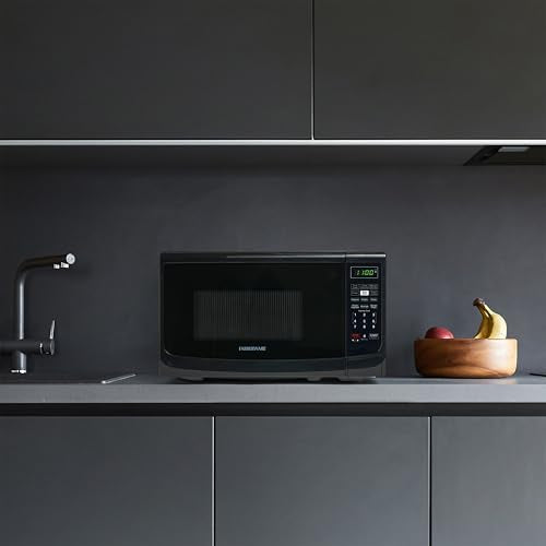 Farberware 0.7 Cu. Ft. Countertop Microwave Oven – 700 Watts Power, Auto Cook Settings, Defrost, Easy Clean and Child Safety Lock - Black