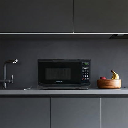 Farberware 0.7 Cu. Ft. Countertop Microwave Oven – 700 Watts Power, Auto Cook Settings, Defrost, Easy Clean and Child Safety Lock - Black