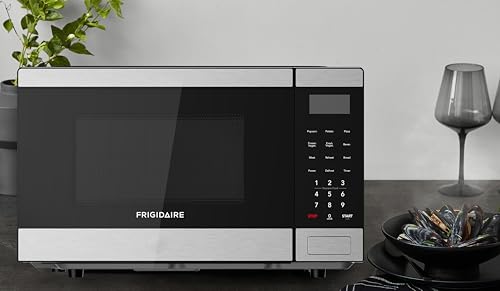 Frigidaire 0.9 CU. FT. Microwave, Digital Control Panel - Auto Cooking Settings - Child Safety Lock - Stainless Steel