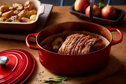 Le Creuset Enameled Cast Iron Signature Oval Dutch Oven, 5 qt, Cerise