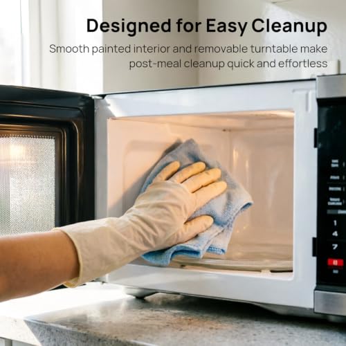Smad Countertop Microwave Oven 1000 Watts, Digital Ovens 1.1 Cu. Ft with 10 Power Levels, 6 One-Touch Presets, Express Cooking, Eco Mode, Child Lock, Easy Clean, Large Capacity, Stainless Steel Black