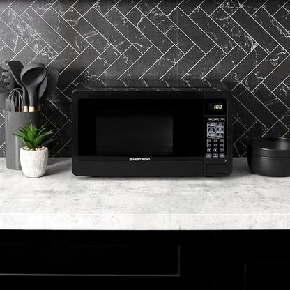West Bend Microwave Oven 700-Watts Compact with 6 Pre-Set Cooking Settings, Speed Defrost, Electronic Control Panel and Glass Turntable, 0.7 Cu.Ft., Black