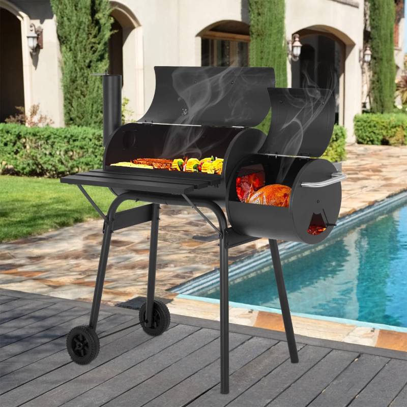 Charcoal grill with food being cooked outdoors near a pool