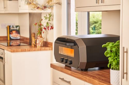 Ooni Volt 12 Electric Pizza Oven - Indoor & Outdoor Versatile Electric Oven, Pizza Cooker with Stone, Indoor and Outdoor Toaster Oven Countertop, Portable Pizza Oven, Cook 12 Inch Pizzas and More - CookCave