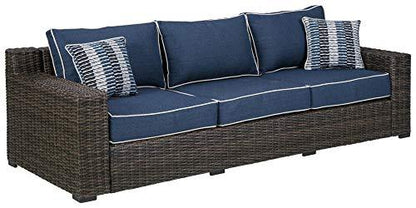 Signature Design by Ashley Grasson Lane Outdoor Patio Wicker Sofa with Cushion and 2 Pillows, Brown & Blue - CookCave
