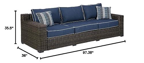 Signature Design by Ashley Grasson Lane Outdoor Patio Wicker Sofa with Cushion and 2 Pillows, Brown & Blue - CookCave