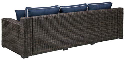 Signature Design by Ashley Grasson Lane Outdoor Patio Wicker Sofa with Cushion and 2 Pillows, Brown & Blue - CookCave