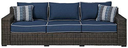 Signature Design by Ashley Grasson Lane Outdoor Patio Wicker Sofa with Cushion and 2 Pillows, Brown & Blue - CookCave