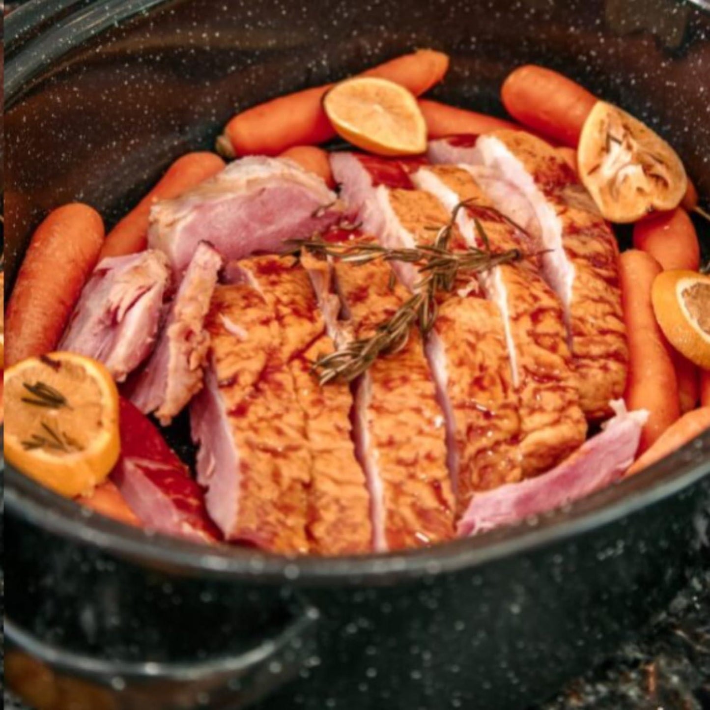 Granite Ware 19 inch oval roaster with Lid design to accommodate up to 20 lb poultry/roast. Resists up to 932°F - CookCave