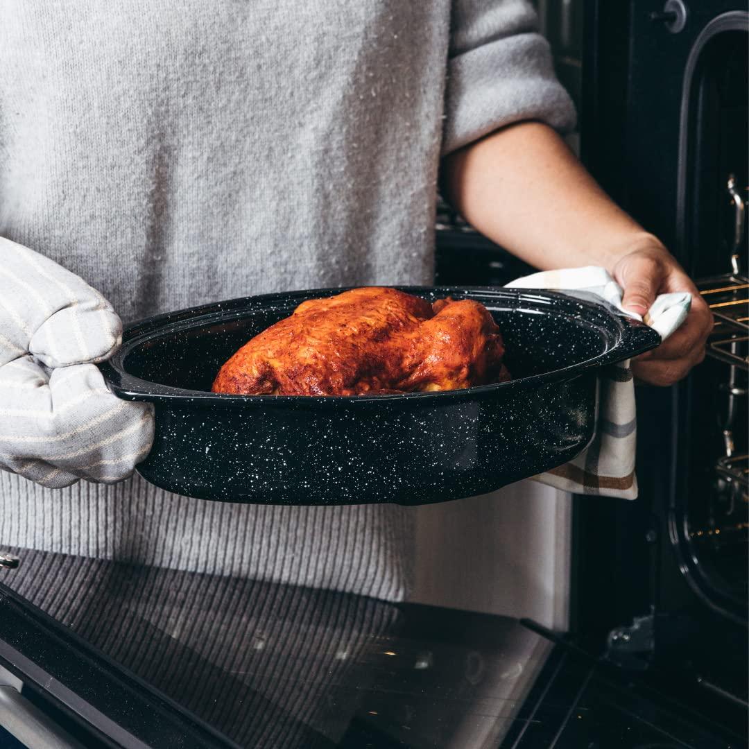 Granite Ware 13-inch oval roaster with Lid. Enameled steel design to accommodate up to 7 lb poultry/roast. Resists up to 932°F. Ideal for preparing meals for two! - CookCave