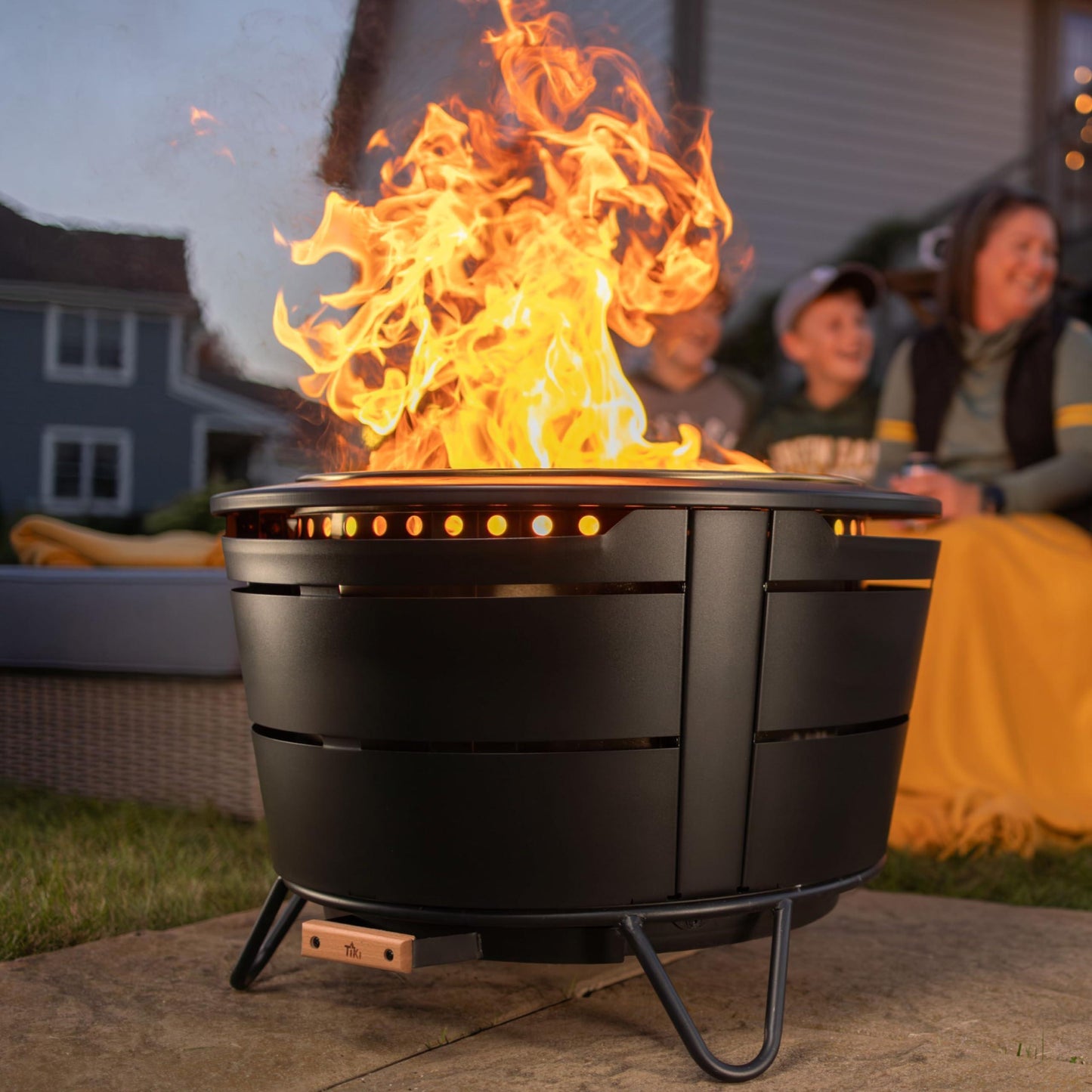 TIKI Brand Reunion Smokeless Fire Pit | Large Wood Burning Outdoor Fire Pit, Great for Large Gatherings - Includes Starter Pack, Modern Design with Removable Ash Pan, 27.5x27.5x20 in, Black - CookCave