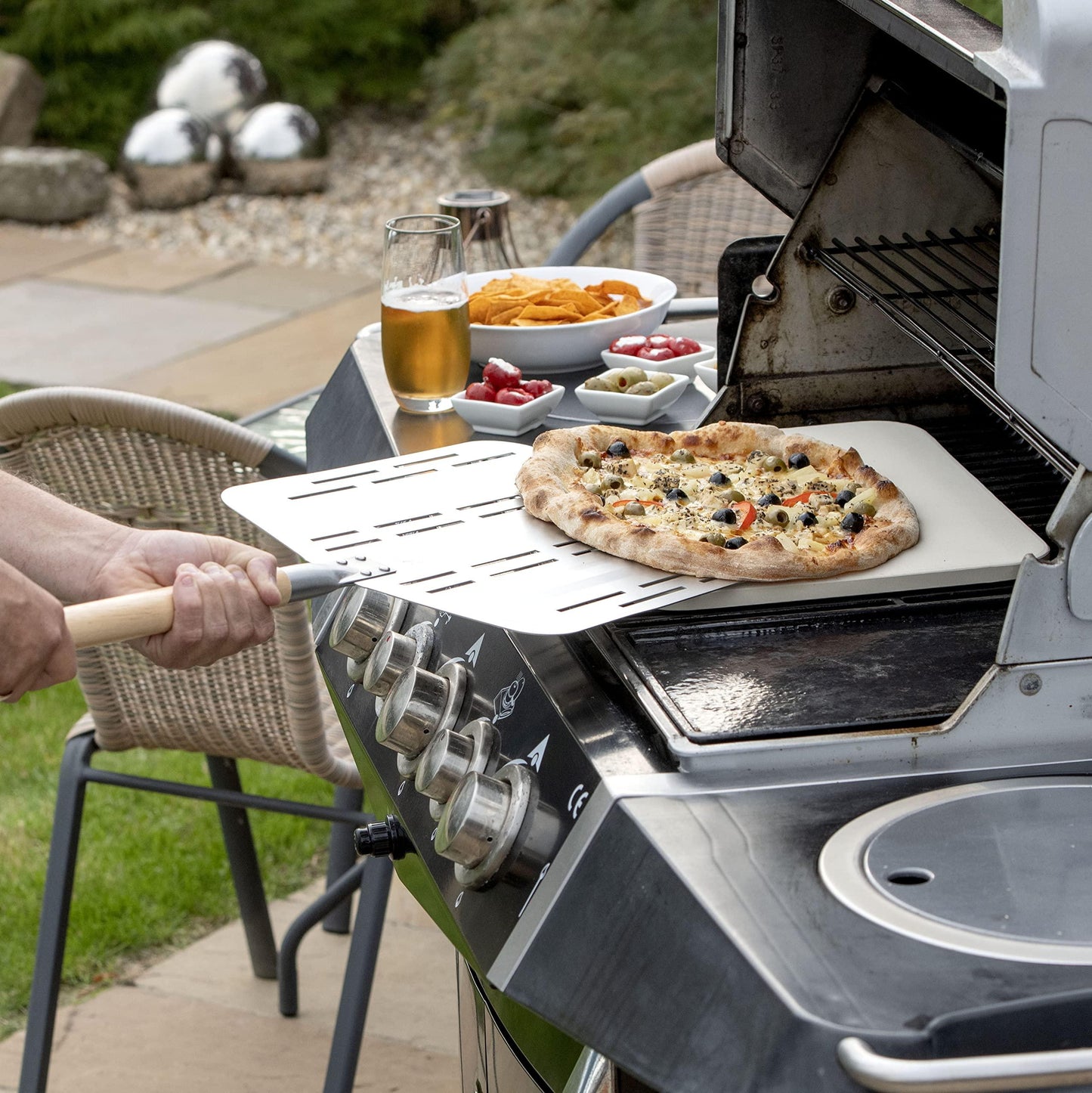 Hans Grill Pizza Stone PRO XL Baking Stone For Pizzas use in Oven, Grill or BBQ FREE Long Handled Anodised Aluminium Pizza Peel | Rectangular Stone 15 x 12" Inches | For Pies, Pastry, Bread, Calzone - CookCave