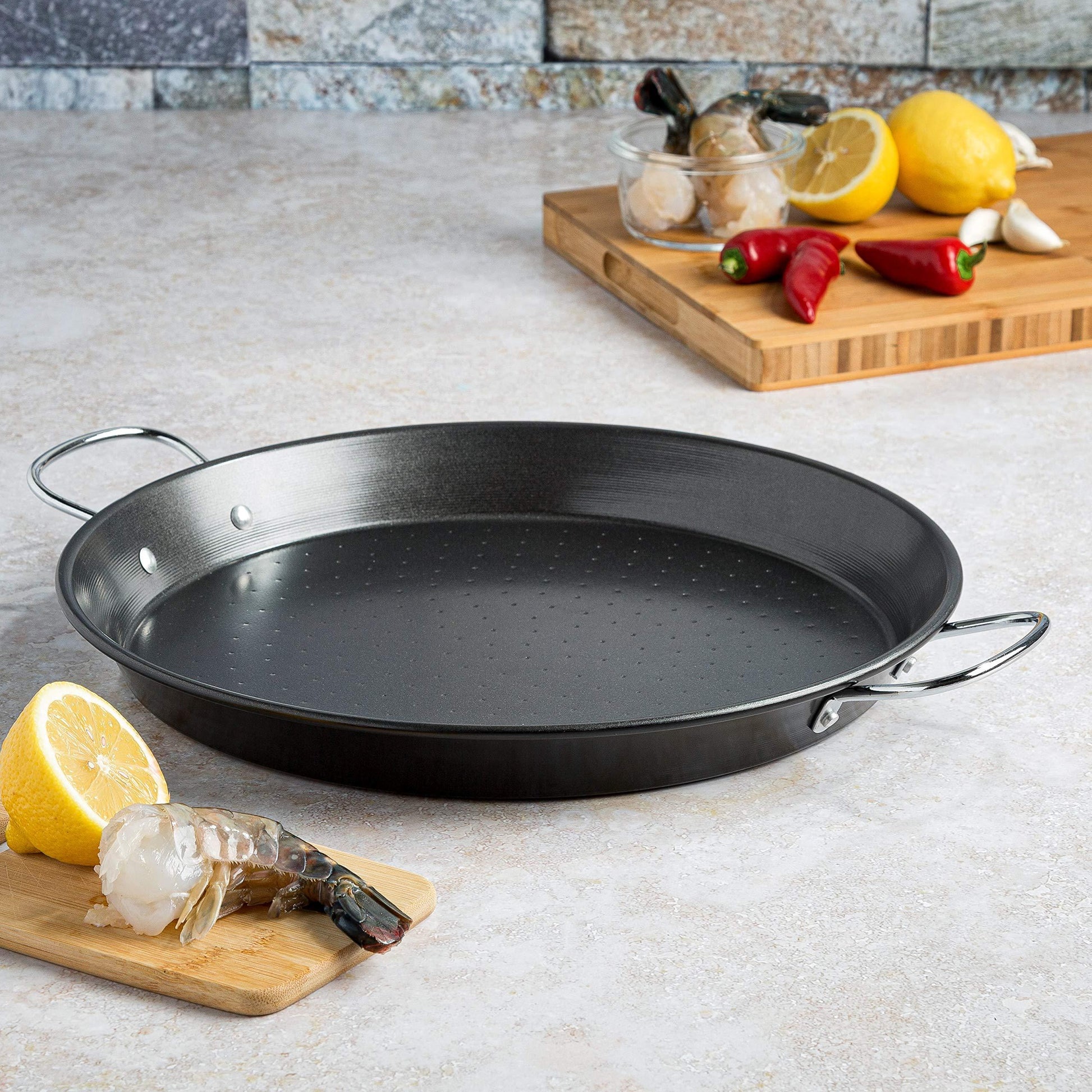 Ecolution Sol Paella Pan – Eco-Friendly PFOA Free Hydrolon Non-Stick – Heavy Duty Carbon steel with Riveted Chrome Plated Handles – Dishwasher Safe – Limited – Black– 15” Diameter - CookCave