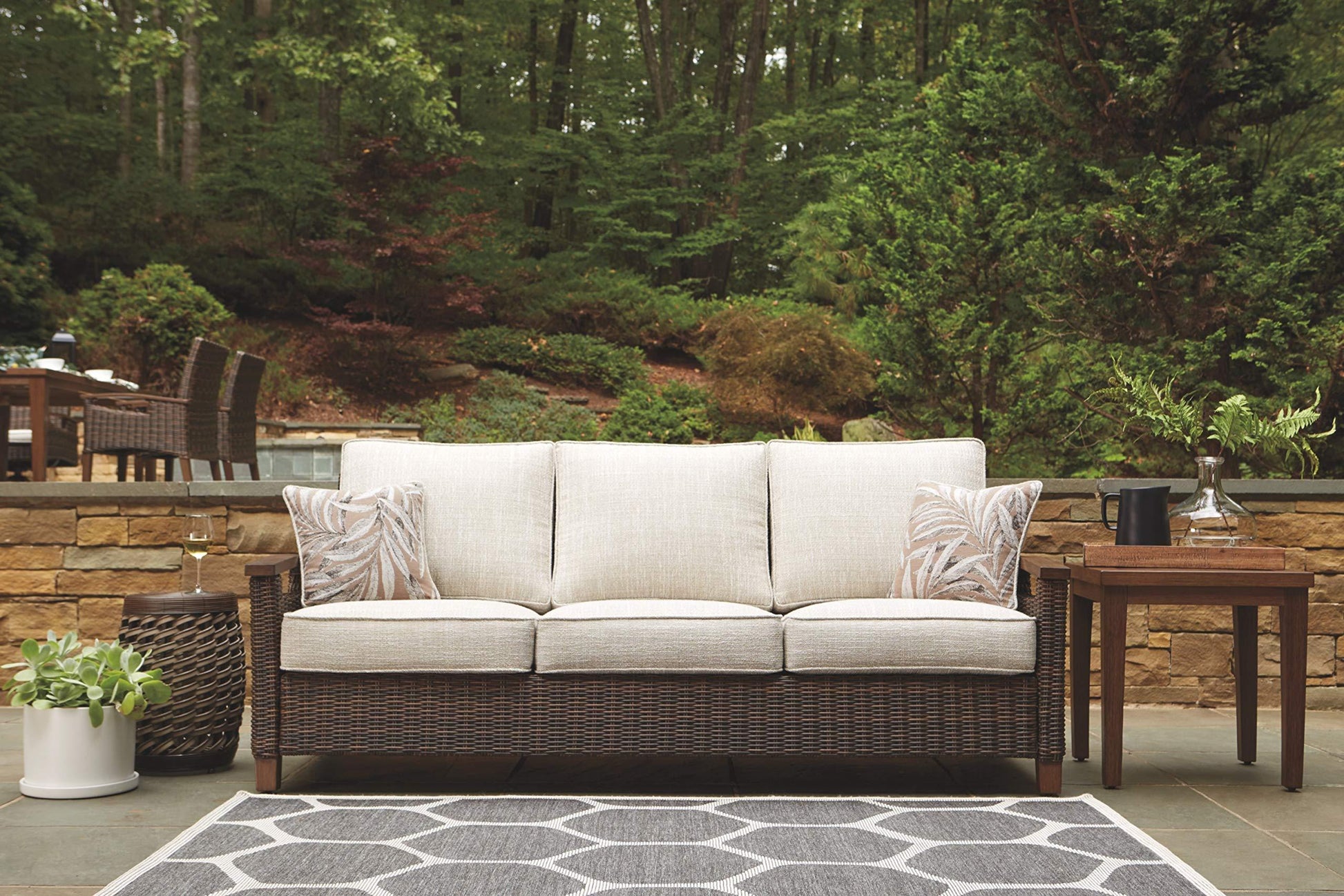 Signature Design by Ashley Paradise Trail Outdoor Patio Sofa with Cushion and 2 Pillows, Brown & Beige - CookCave